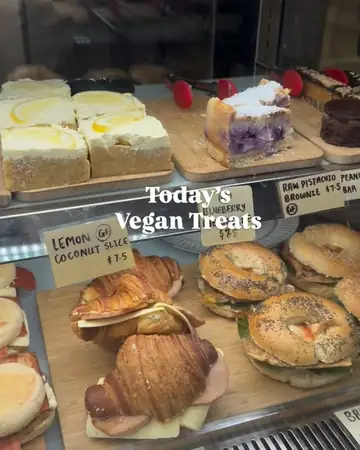 Cabinet of vegan cakes, croissants and bagels